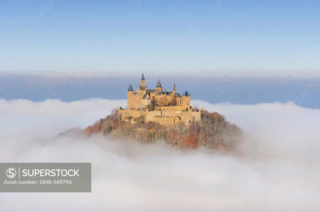 Burg Hohenzollern castle rises from the fog during a temperature inversion, Zollernalbkreis district, Baden-Wuerttemberg, Germany, Europe