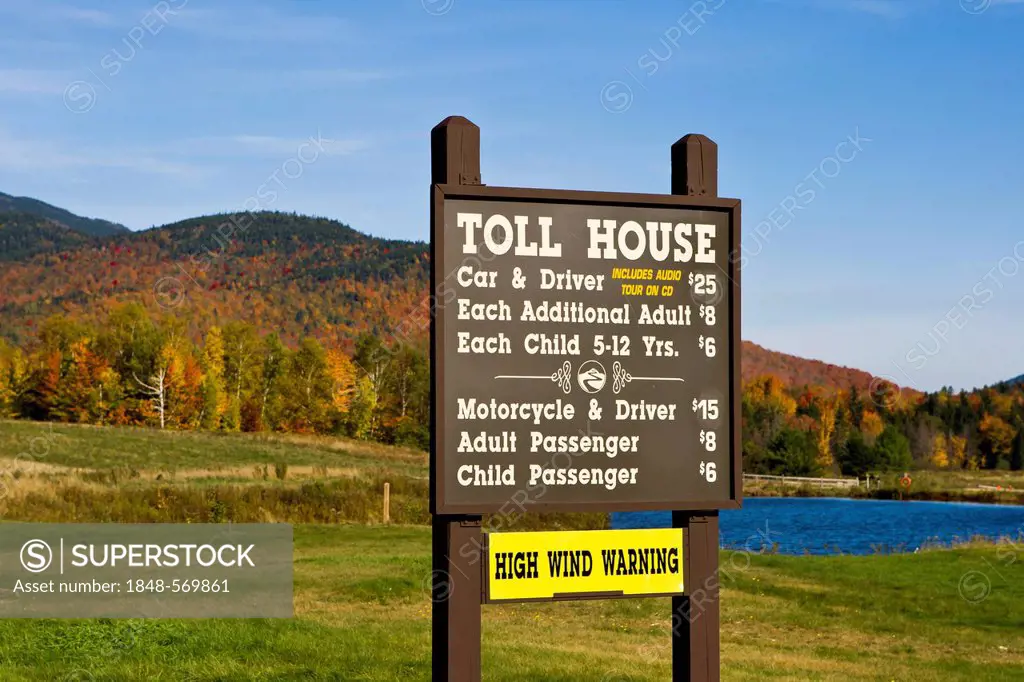 Sign with toll rates, entrance to Mount Washington National Park, New Hampshire, USA