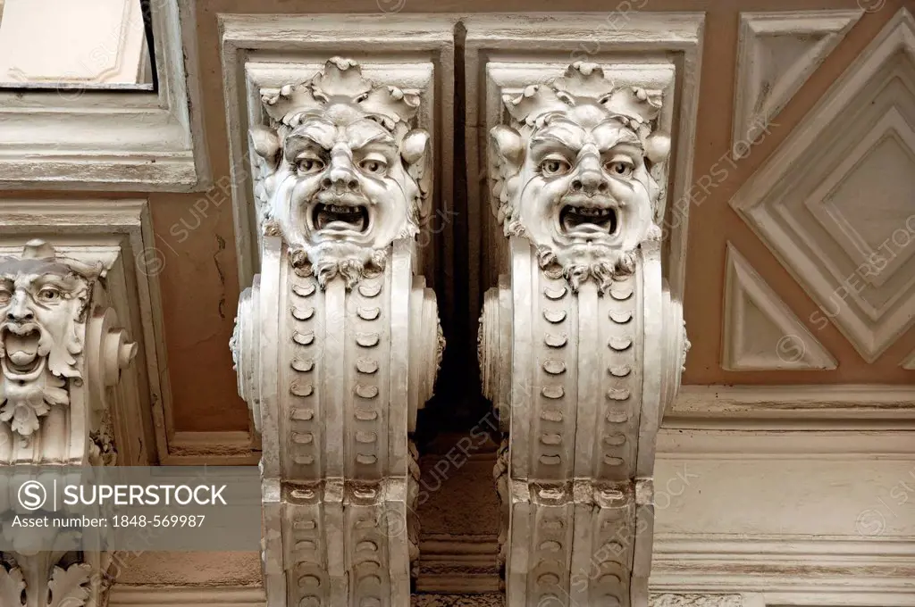Two grotesques, statues, underneath the balcony of an art nouveau town house, built around 1900, Gruenangergasse street 2, Vienna, Austria, Europe