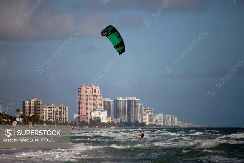 Apartment buildings and a kitesurfer on the long sandy beach of Fort Lauderdale, Broward County, Florida, USA