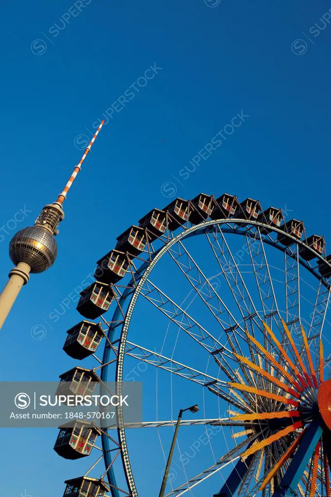 Fernsehturm television tower and Ferris wheel against a blue sky, Berlin, Germany, Europe, PublicGround
