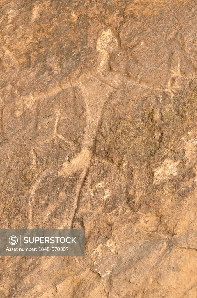 Stone Age rock carving of a man in the UNESCO World Heritage site of Gobustan with about 6, 000 rock carvings up to 40, 000 years, near the district t...