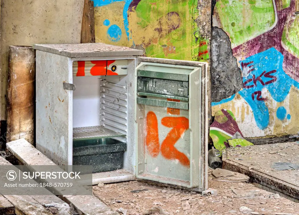 Refrigerator, graffiti, abandoned factory
