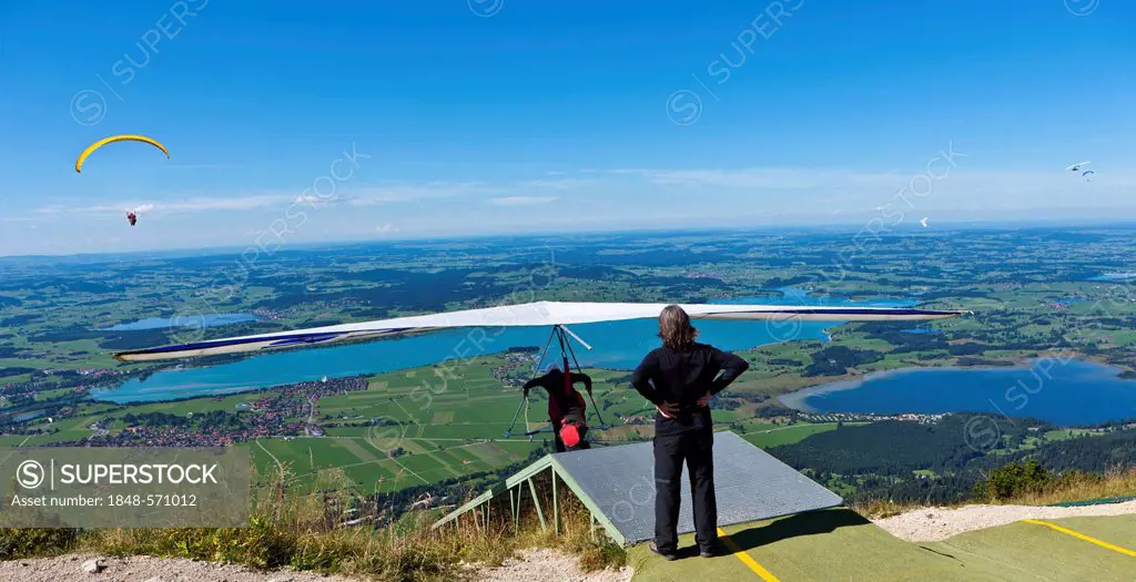 Hang glider starting from launching site, Mt Tegelberg, Froggensee Lake at back, Upper Bavaria, Germany, Europe, PublicGround