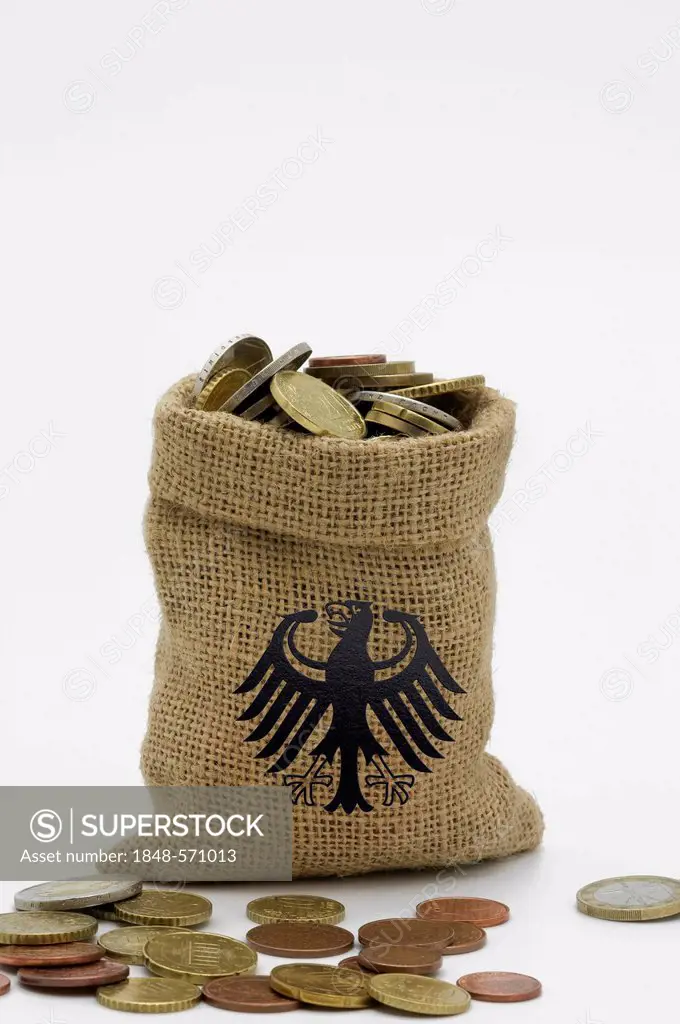 Federal eagle image on money bag filled with euro coins, coins in front of it, symbolic image for Germany's prosperity