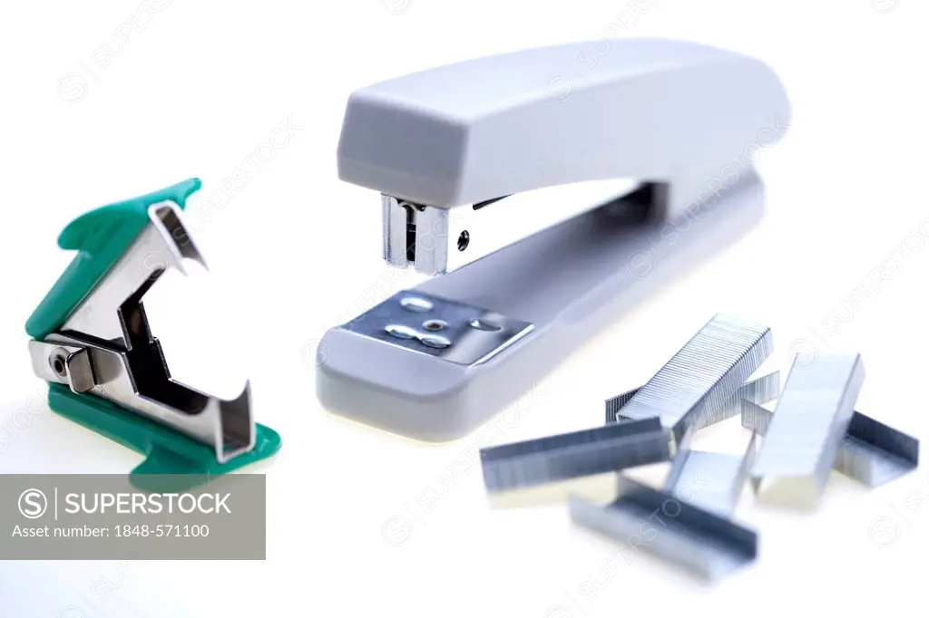 Grey stapler with staples and staple remover