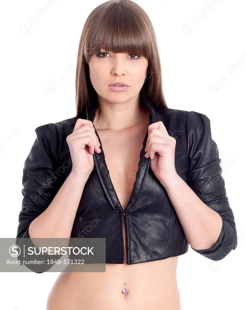 Young woman in a short black leather jacket with a bare midriff