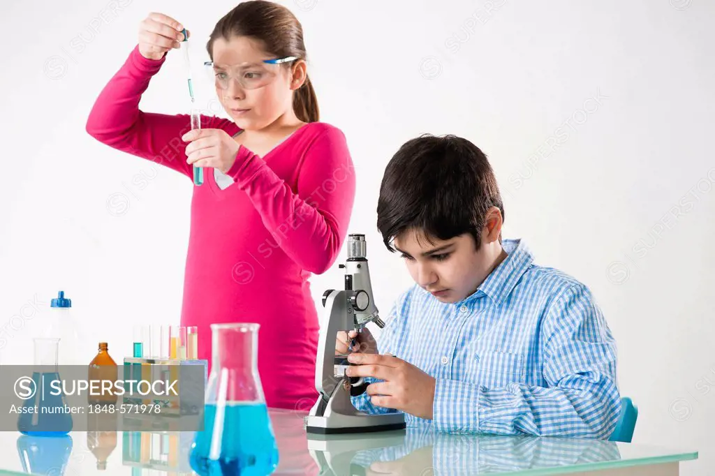 Boy and girl during a chemistry class
