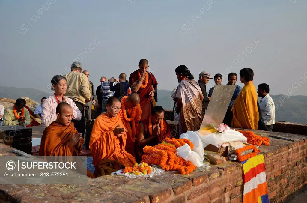 Monks and Buddhist dignitaries from Laos, Burma, Cambodia, Korea, Tibet, from all Buddhist traditions and schools gather for a communal prayer at Budd...