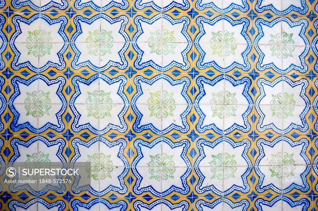 Azulejos, tiles, in the town of Tavira, eastern Algarve, Portugal, Europe