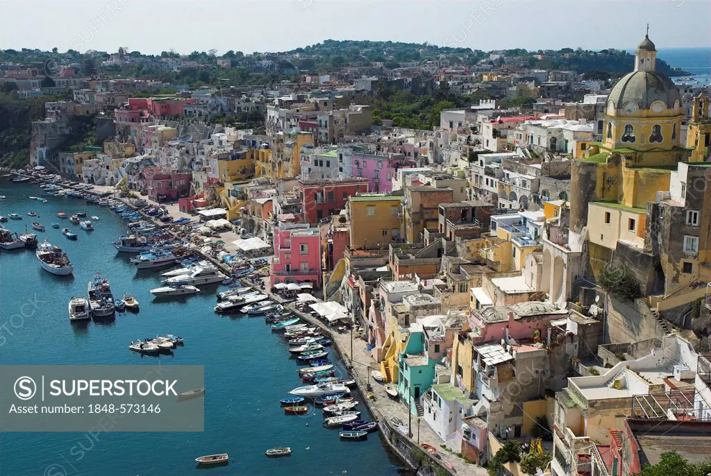 The colorful houses of the fishing harbour of Procida island, Flegrean Islands, Gulf of Naples, Campania, southern Italy, Europe