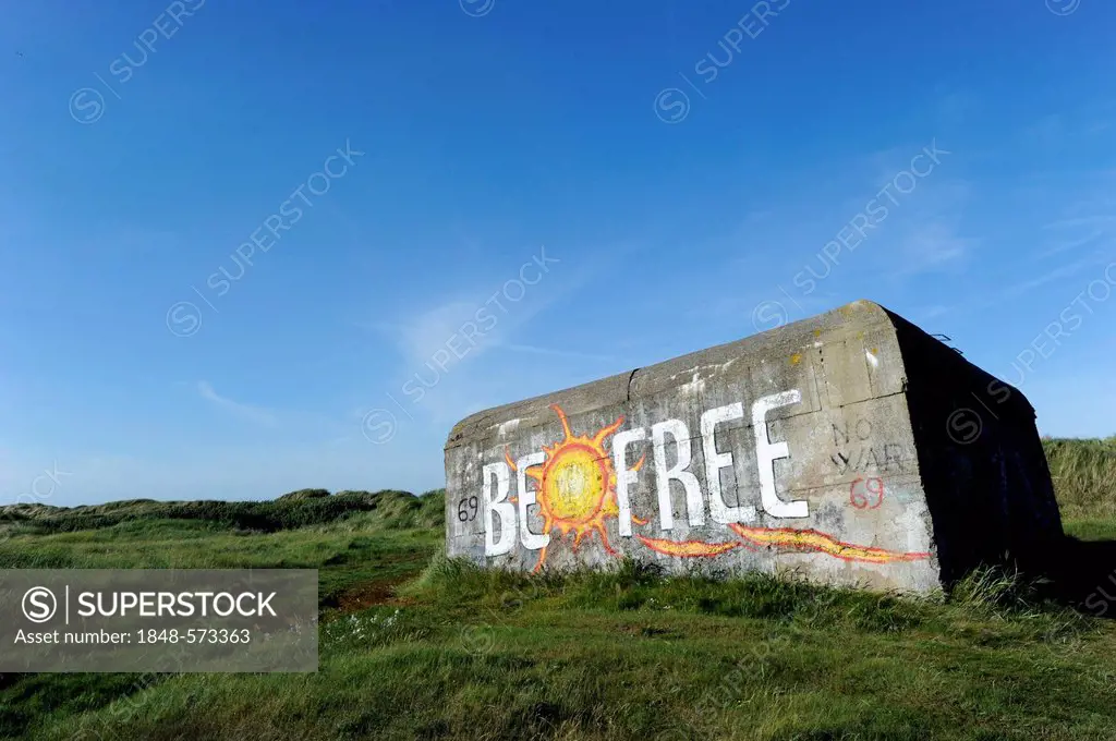 Old bunker in the dunes, with the graffiti Be Free, Fano island, Denmark, Scandinavia, Europe