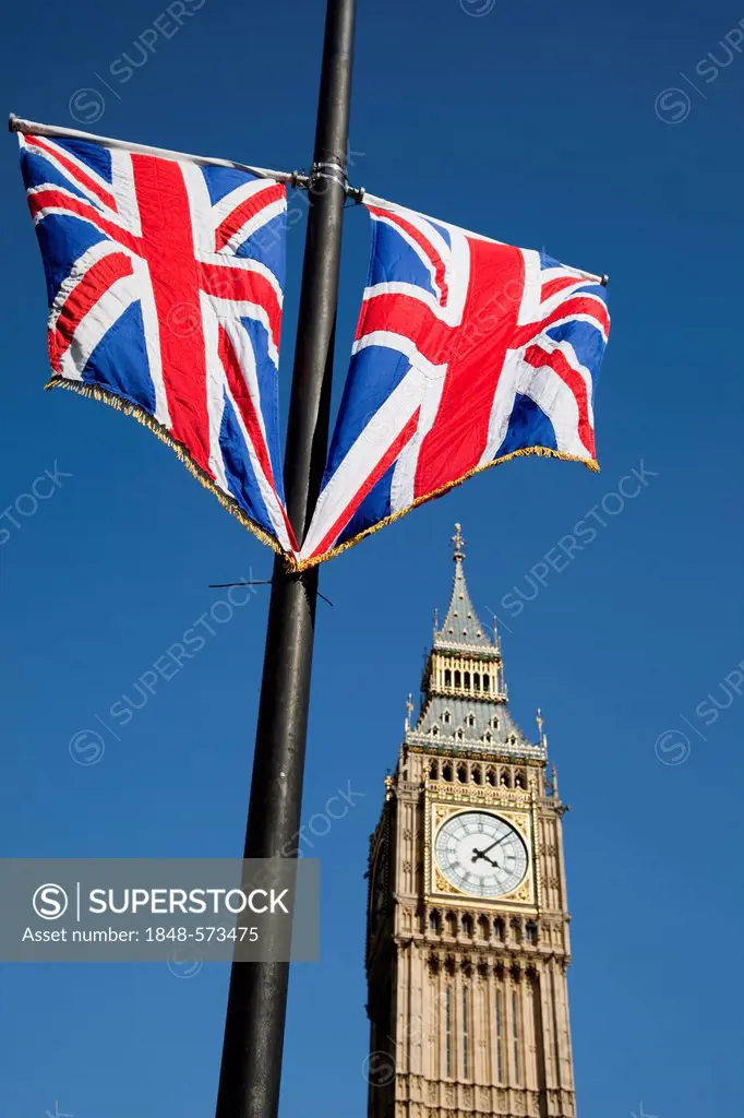 Union Jack flags fly in front of London's Big Ben, London, England, United Kingdom, Europe