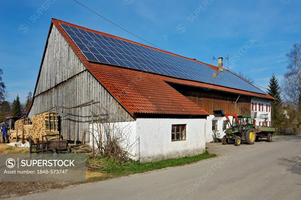 Farm with solar panels on the roof, near Diessen on Lake Ammer, Bavaria, Germany, Europe