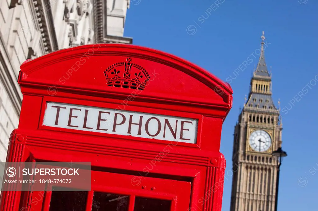 Red telephone booth near Big Ben, London, England, United Kingdom, Europe