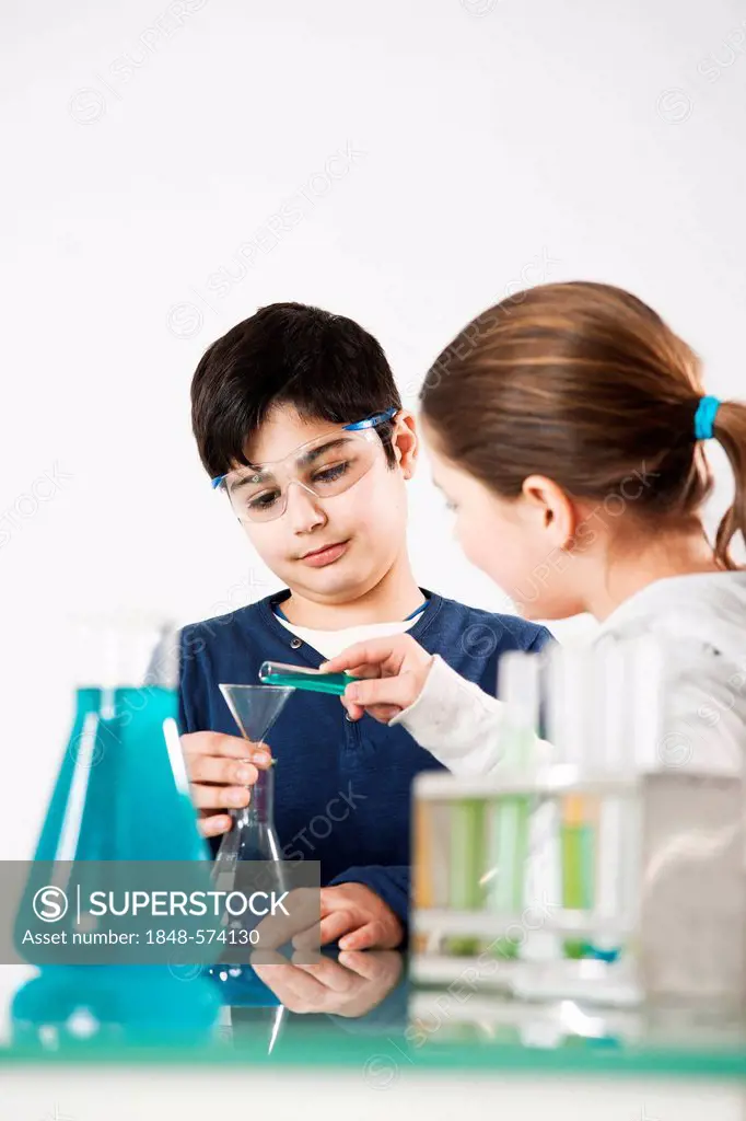 Boy and girl during a chemistry class