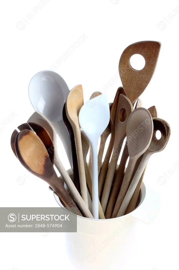 Several kitchen spoons, wooden and plastic