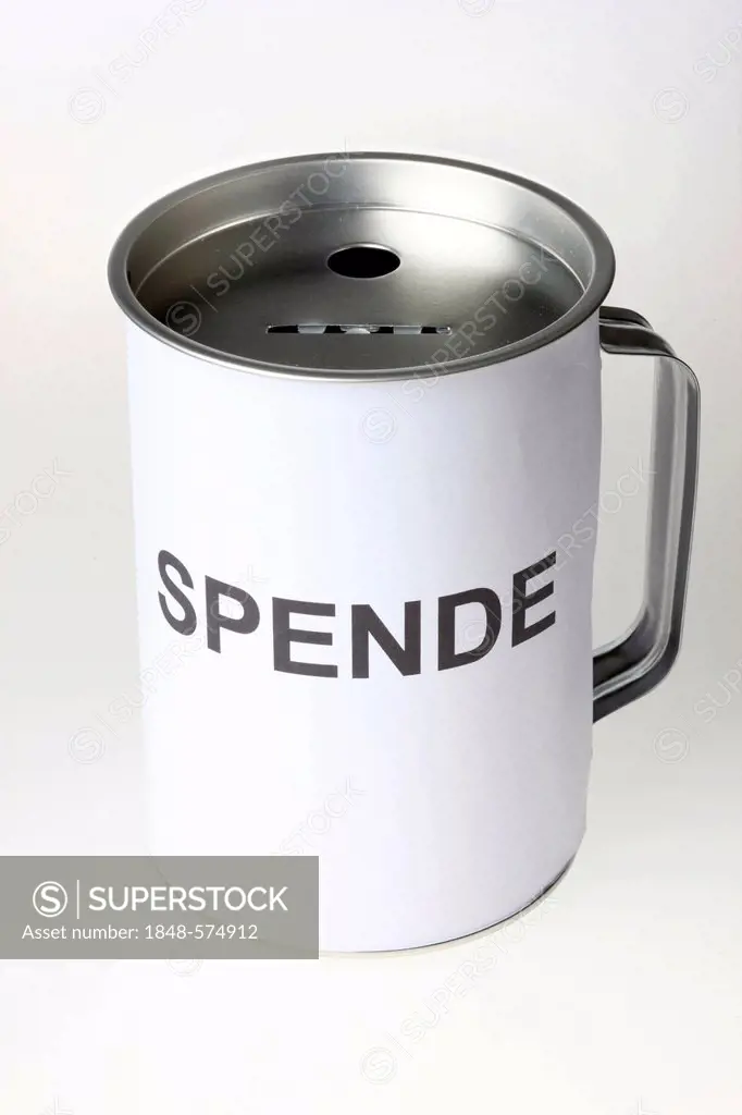 Donation box labeled Spende, German for donation, with slots for coins and bills