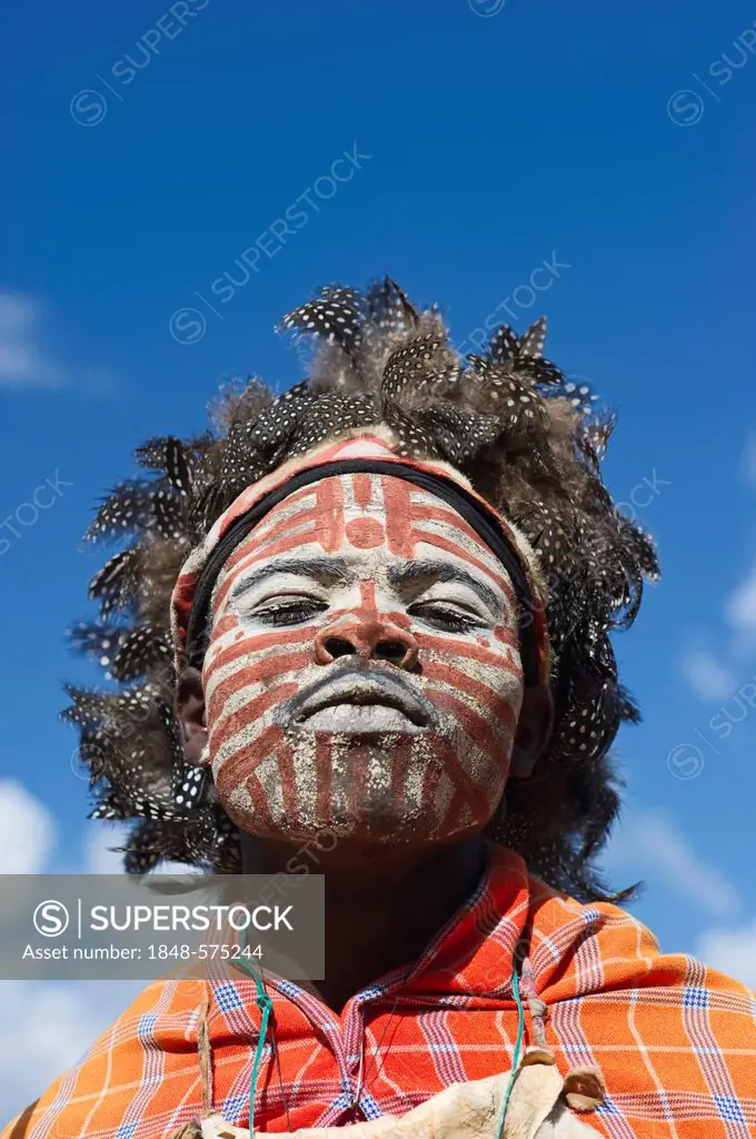 Kikuyu warrior wearing headdress made of Helmeted Guineafowl feathers, Tomson Falls, Kenya, Africa