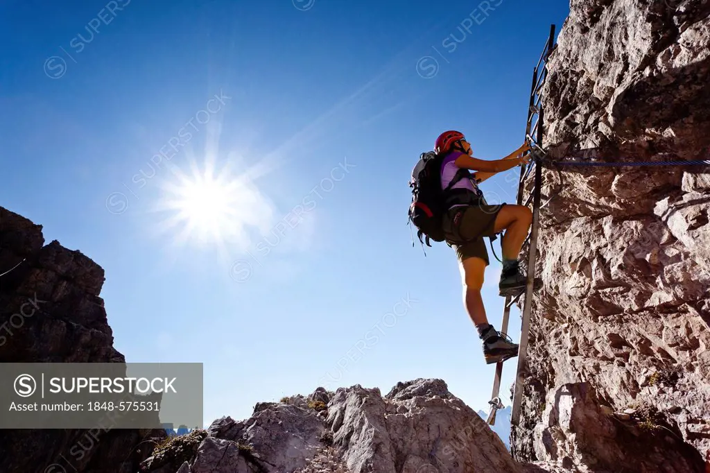 Climber climbing Mt Paterno, Sesto, Sexten, Alta Pusteria Valley, Dolomites, South Tyrol, Italy, Europe