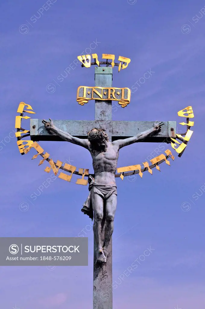 Crucifix on Charles Bridge, UNESCO World Heritage Site, Prague, Bohemia, Czech Republic, Europe