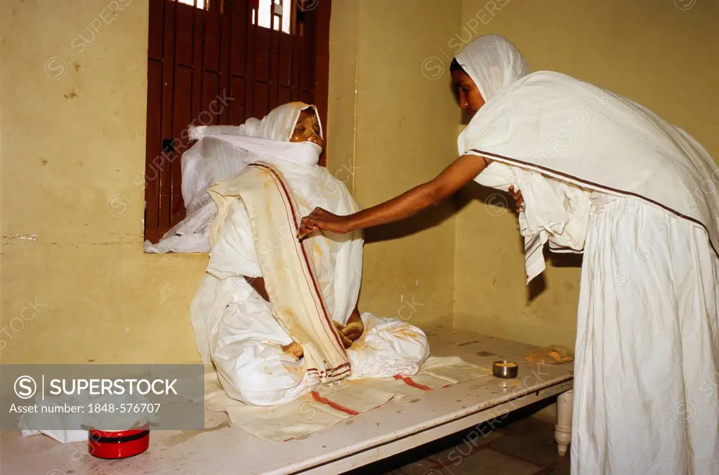 Passed away Jain nun lying in state to bid farewell in her room, Palitana, Gujarat, India, Asia