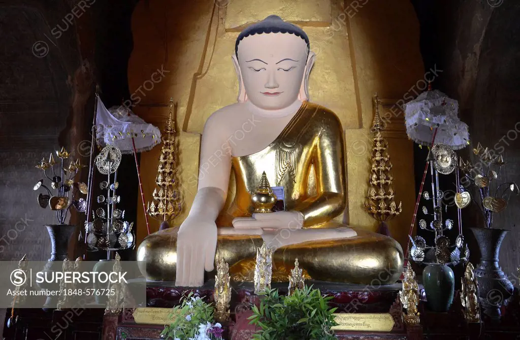 Partly gilded seated Buddha in a pagoda, Old Bagan, Pagan, Burma, Myanmar, Southeast Asia, Asia