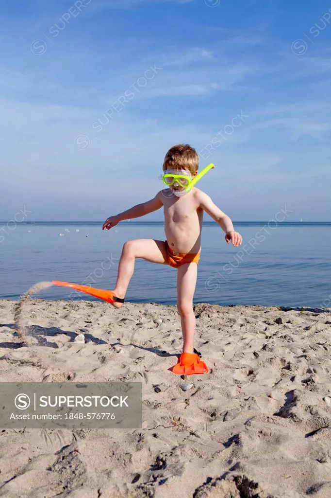 Young boy with diving goggles, snorkel and flippers, beach of Kuehlungsborn, Mecklenburg-Western Pomerania, Germany, Europe