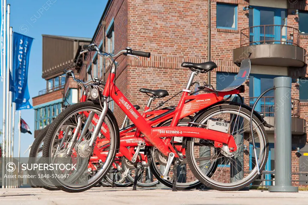 Rental bikes from StadtRad, city bike, on the roadside in Hamburg's HafenCity, Hamburg, Germany, Europe