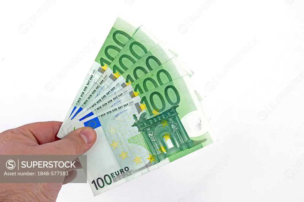 One hand holding 100 Euro banknotes