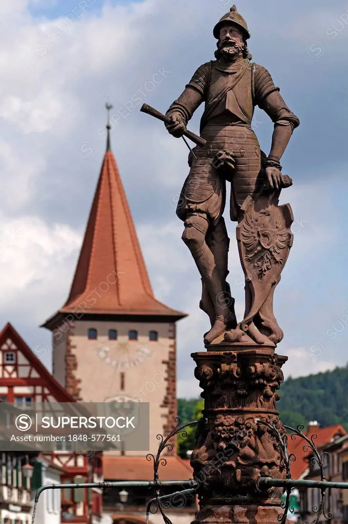 Statue of a knight on Roehrbrunnen fountain, coat of arms on the shield, 1582, by Max Spranger from Strasbourg, Haigeracher Tor gate from the 17th cen...