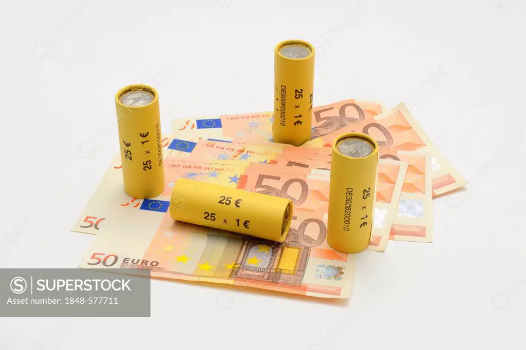Rolls of one euro coins and euro banknotes