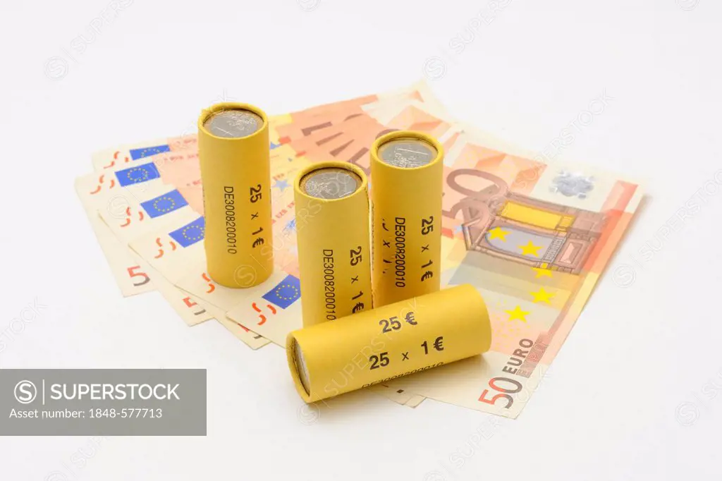Rolls of one euro coins and euro banknotes