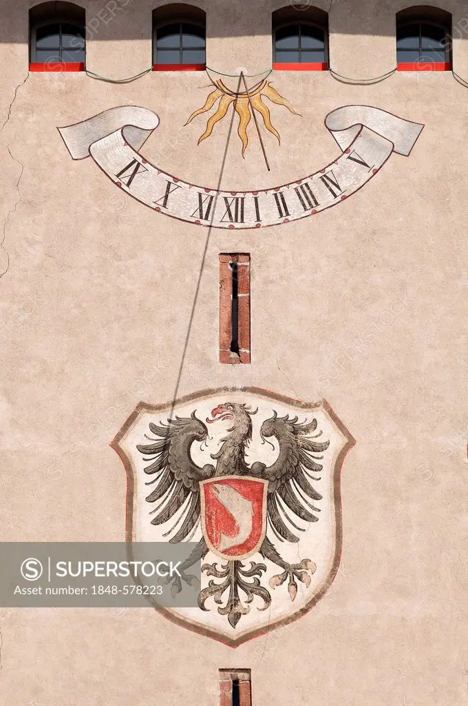 The coat of arms of and the sundial on Obertorturm tower, Haigeracher Tor Gate, 17th century, Victor-Kretz-Strasse street, Gengenbach, Baden-Wuerttemb...