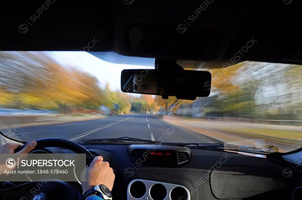 Driver at the wheel of a car whilst driving