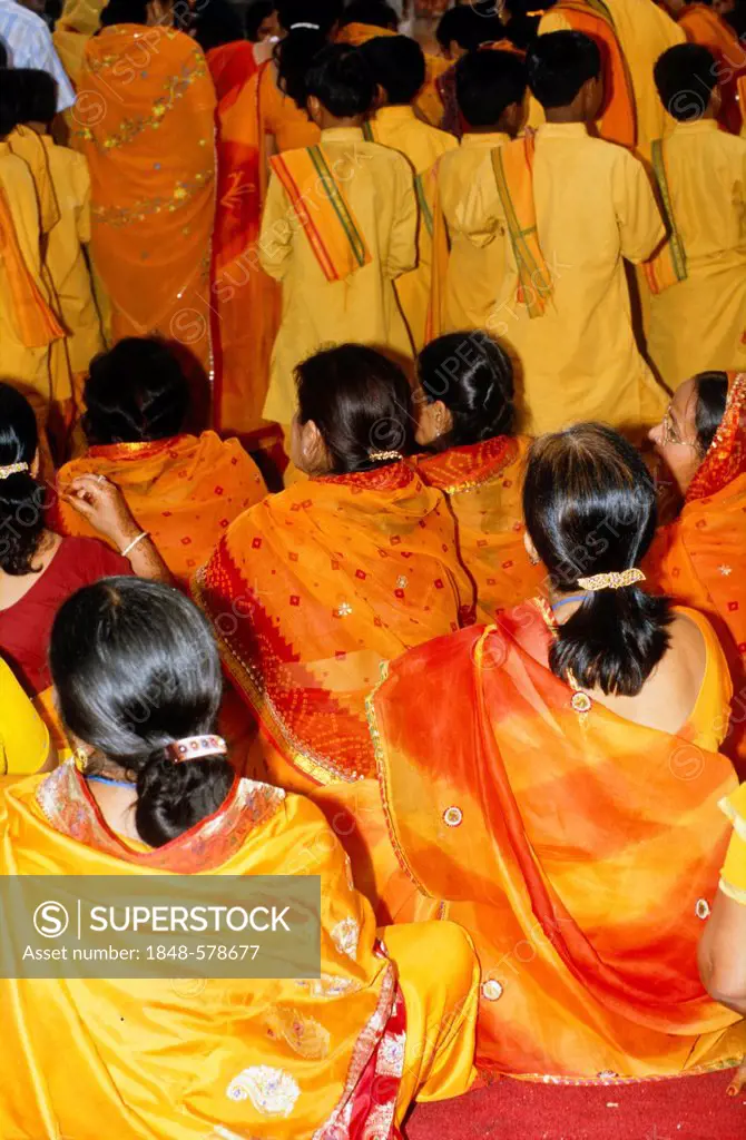 A group of women joining the Aartii Ceremony at Ram Jhula in Rishikesh, Uttarakhand, formerly Uttaranchal, India, Asia