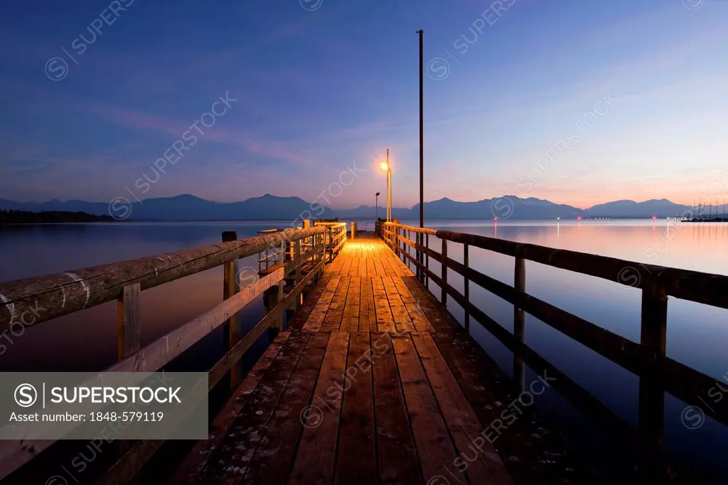 Jetty in Seebruck on Chiemsee lake overlooking the Chiemgau Alps at dusk, Bavarian Alps, Bavaria, Germany, Europe, PublicGround