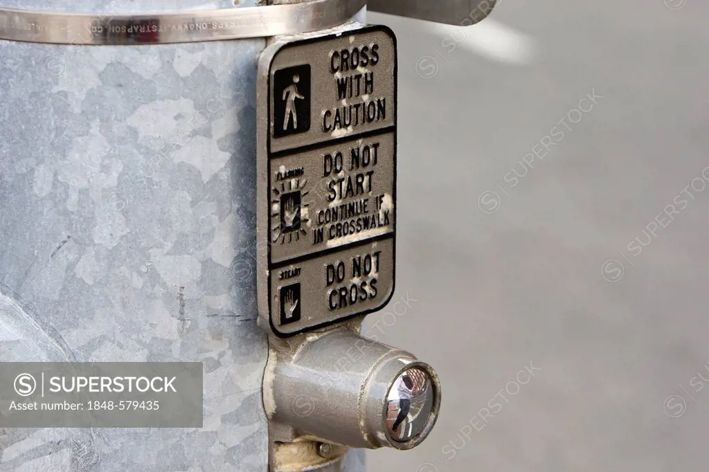Stop button on an American traffic light, USA