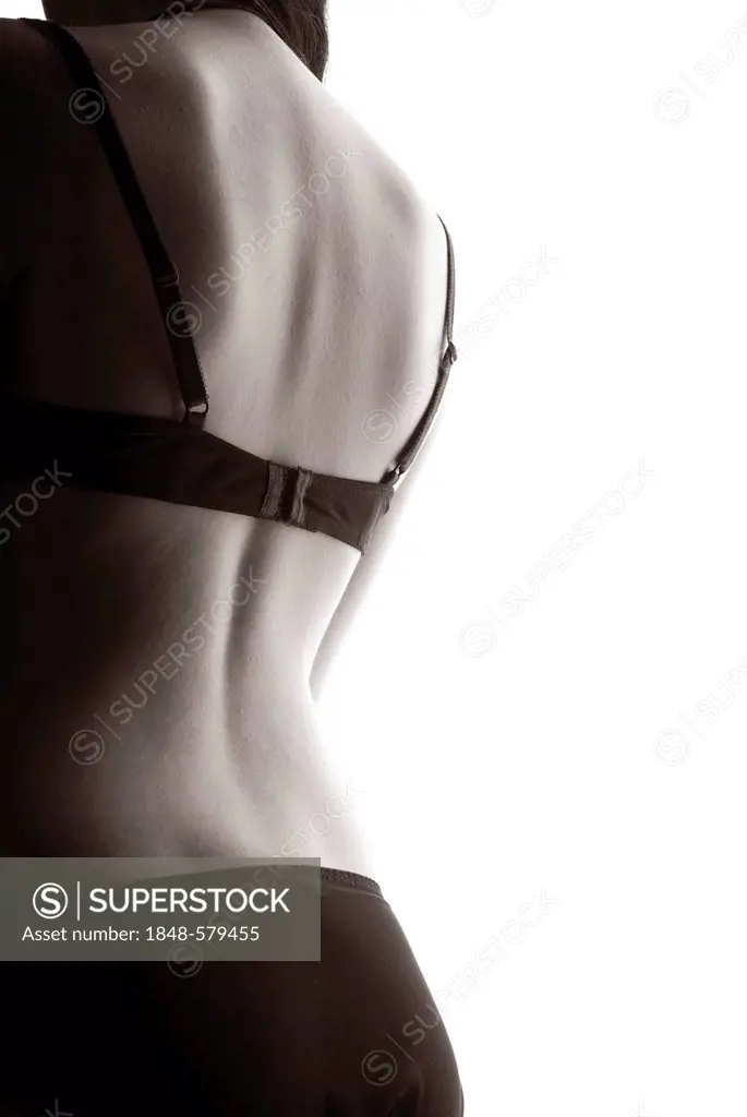 Woman wearing lingerie, back