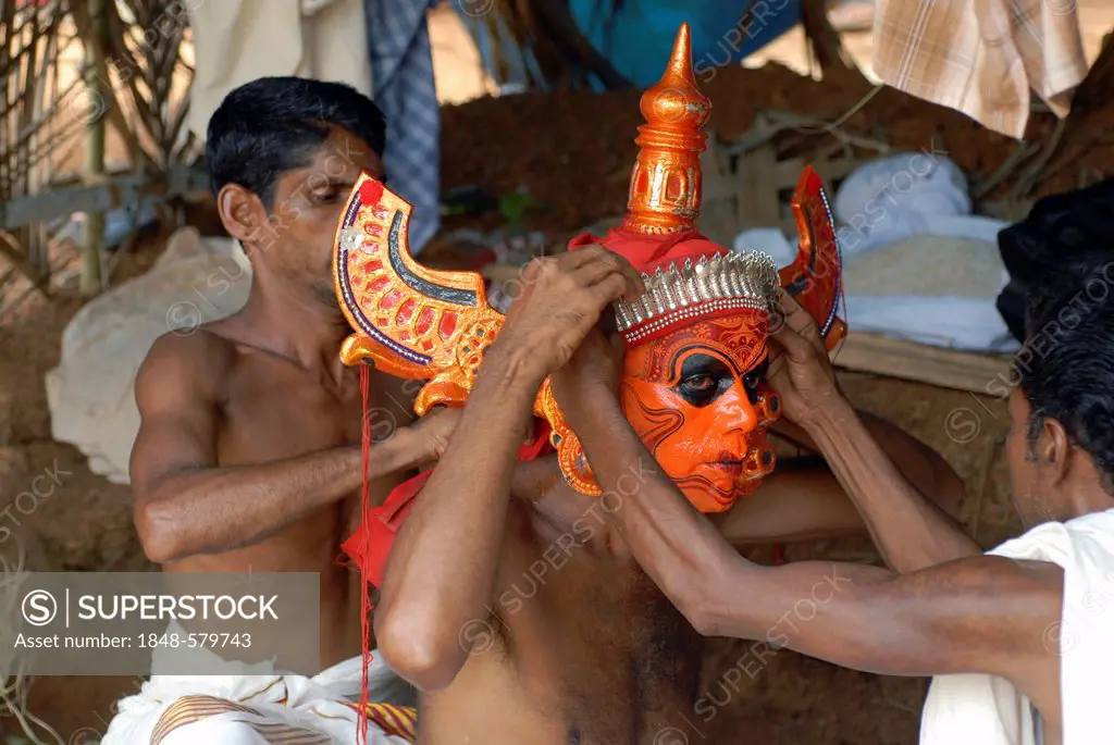 Theyyam performers preparing for a ritual, near Kasargod, North Kerala, South India, Asia