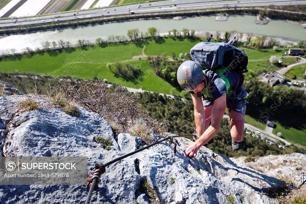 Climber at the Kaiser-Max via ferrata, at the Martinswand mountain face near Innsbruck, North Tyrol, Austria, Europe