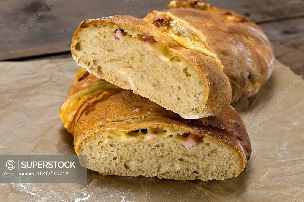 Crumb of home baked bread, Handbrot, with a filling of ham and Emmental cheese, Saxon specialty
