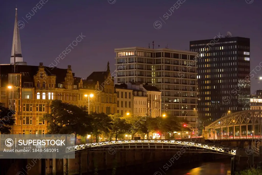 Office buildings, St. Katharinen Church and Kibbelstegbruecke bridge on the Zollkanal canal in the evening, Hamburg, Germany, Europe