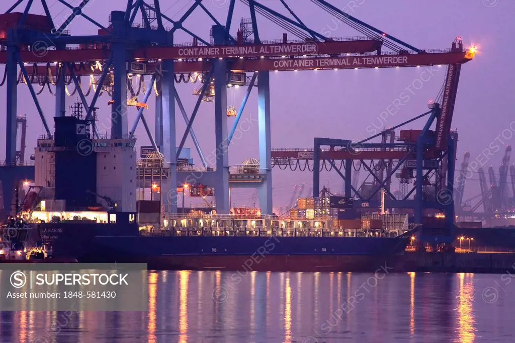 Container ship is loaded at dusk, Altenwerder Container Terminal, Port of Hamburg, Hamburg, Germany, Europe