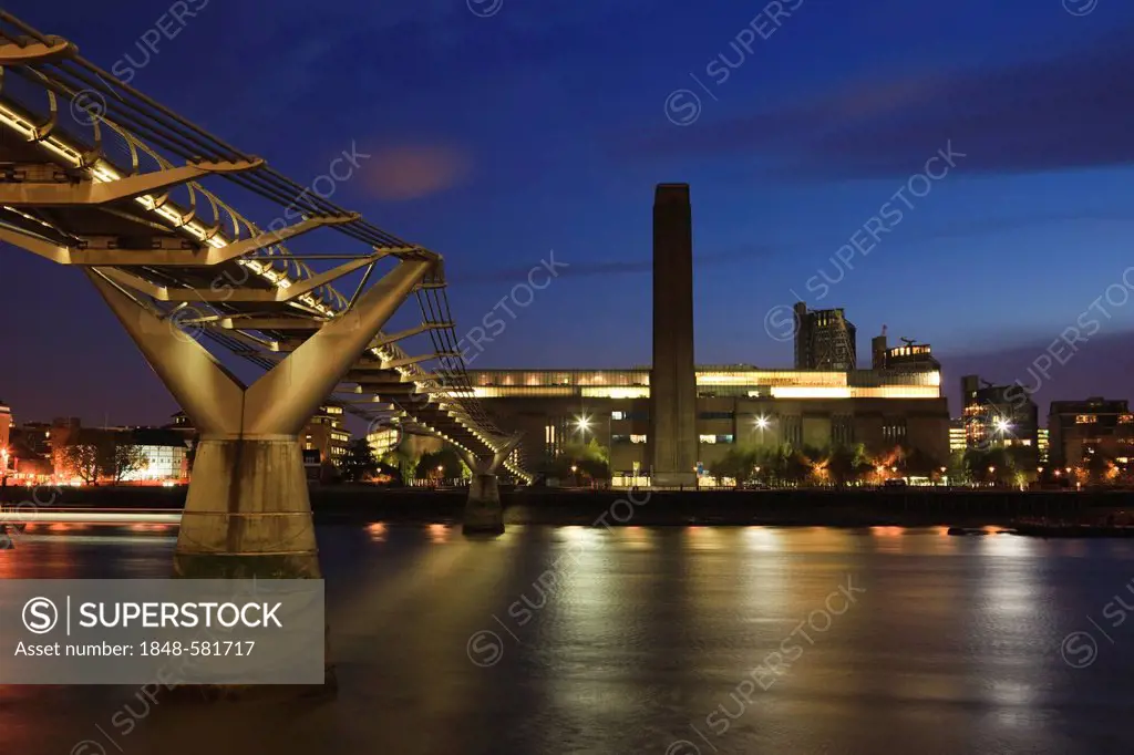 Millennium Bridge footbridge with Tate Modern on the south bank of the River Thames at dusk, London, England, United Kingdom, Europe