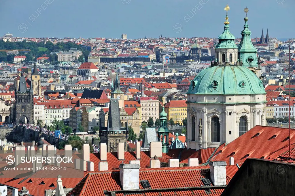 Panoramic view across the historic centre of Prague, UNESCO World Heritage site, with St Nicholas Cathedral, Prague, Bohemia, Czech Republic, Europe, ...