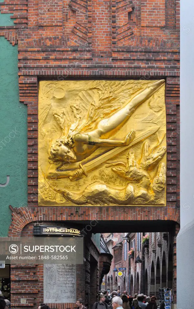 Facade relief Lichtbringer, light bearer, by Hoetger, at the entrance to Boettcherstrasse street, Bremen, Germany, Europe