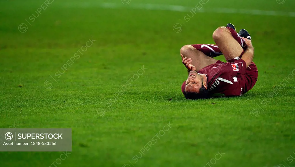 Cristian Molinaro, VfB Stuttgart, injured player writhing on the ground, SGL Arena, Augsburg, Bavaria, Germany, Europe