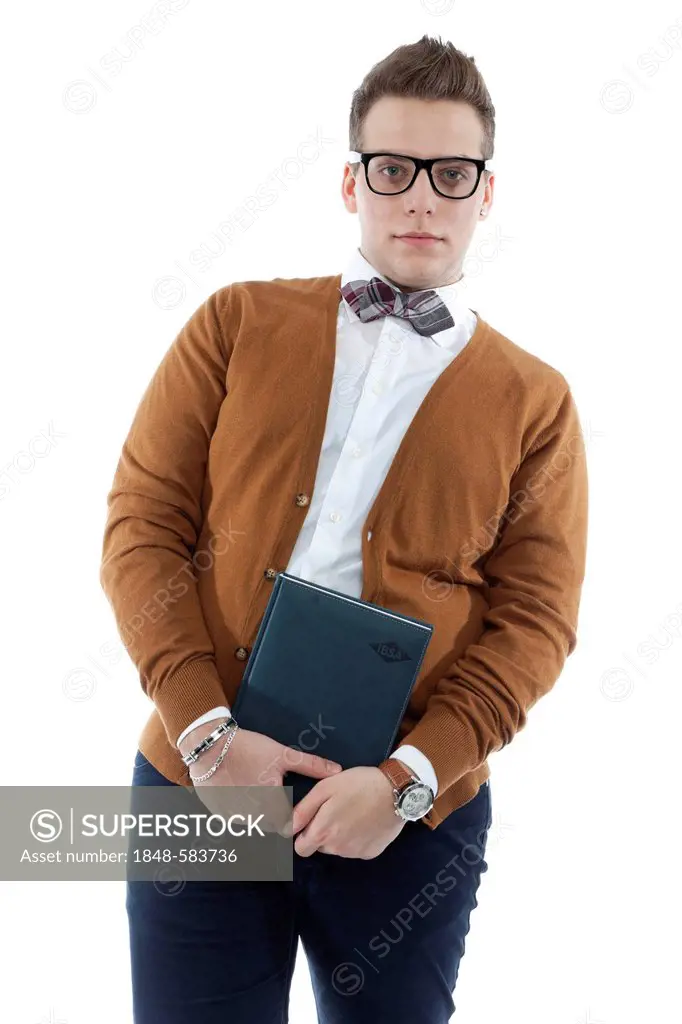 Young man with glasses and bow tie holding a book, diary