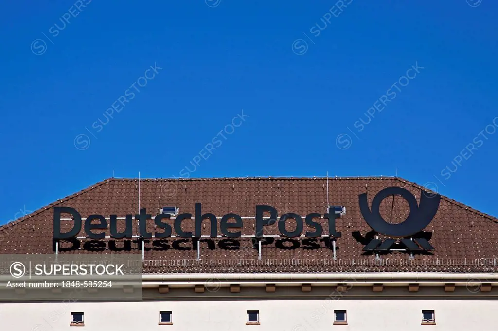 Deutsche Post logo with a post horn, German post office, branch in Berlin, Germany, Europe